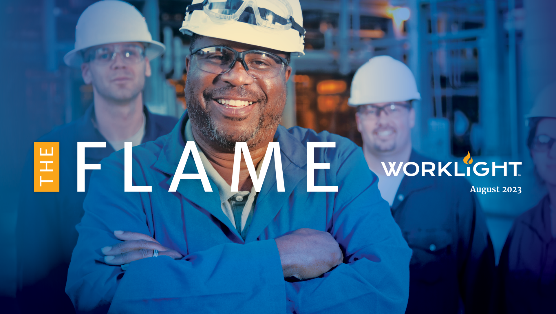 three men in their work uniforms smiling at the camera. Over the image are the words "The Flame" and the WorkLight logo.
